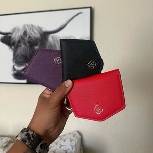 Kendra Scott 
Red, Black, and Purple Card Holders
